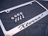 Nissan Xterra Chrome License Plate Frame Black Script Letters w/ Logo Screw Caps