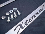 Nissan Xterra Chrome License Plate Frame Black Script Letters w/ Logo Screw Caps
