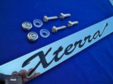 Nissan Xterra Chrome License Plate Frame Black Script Letters w/ Logo Screw Caps