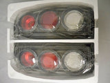 Winjet 1998-2000 Nissan Frontier Carbon Fiber Look Tail Lights Lamps Set Pair